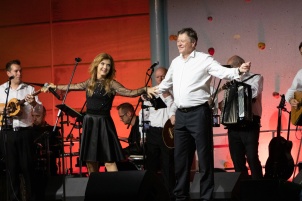 Prifarski muzikanti performing with guests, Nuška Drašček, Irena Vrčkovnik, Tjaša Cigut, Anja Bukovec, Jasmina Levičar and Dado Kladenik. The concert was hosted by Slovenian television and radio host Boštjan Romih.