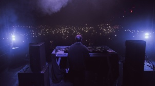 German DJ Allefarben performing in Rakican Castle during Halloween music festival.