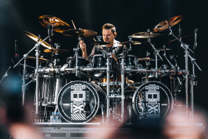 Vienna gets a front-row view of Five Finger Death Punch's mayhem! Dive into the band's energy, the mosh pit's fury, and all the fire-fueled madness. Crank up the volume and see the concert through a new zoom lens!